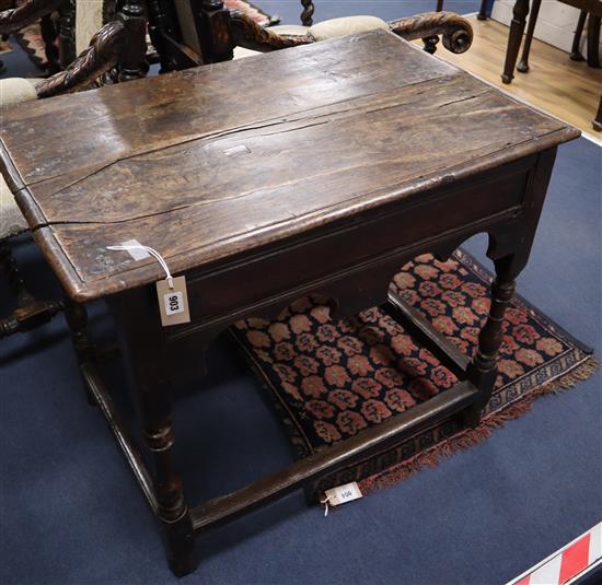 A 17th century small oak side table W.86cm